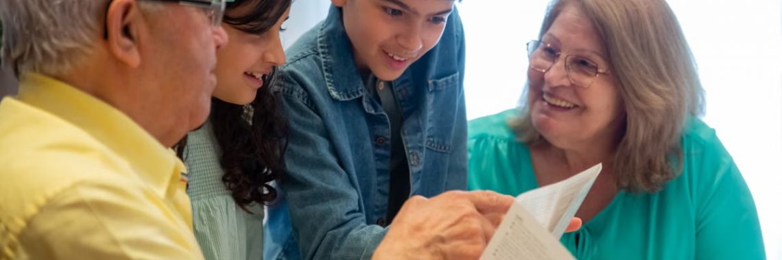 Happy family moments with grandparents and grandchildren enjoying time together indoors.
